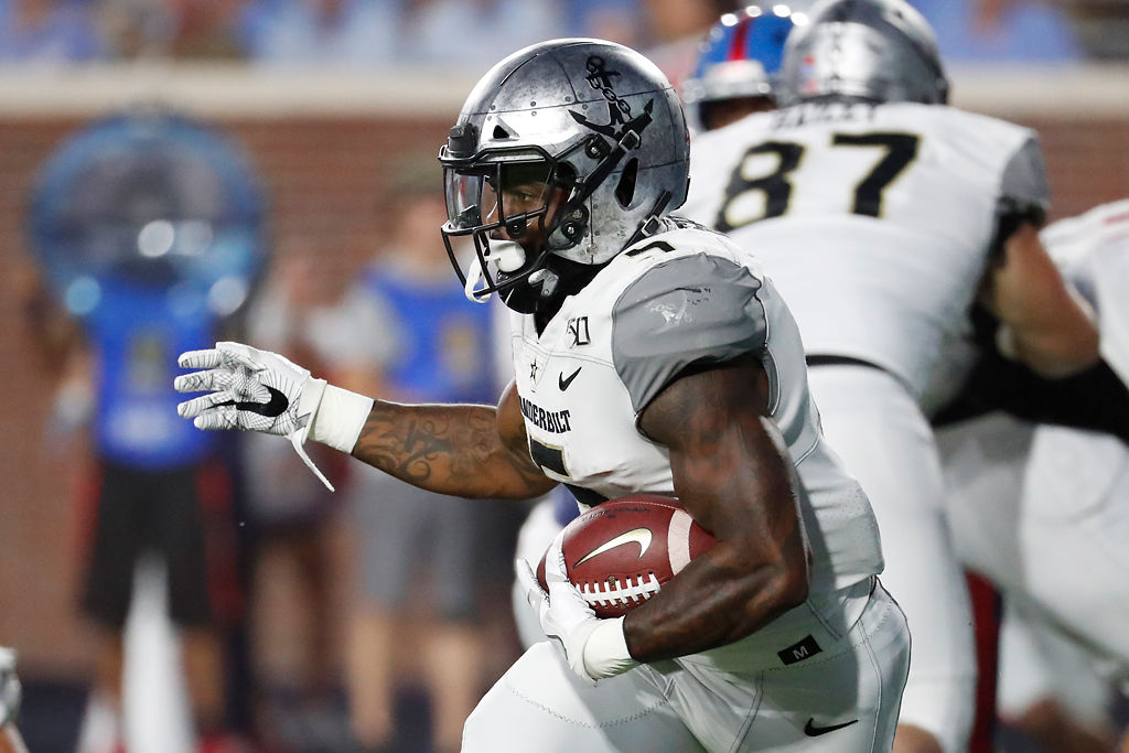 Vanderbilt running back Ke'Shawn Vaughn (5) runs upfield